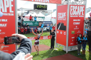 Men's winner Javier Gomez crosses finish line