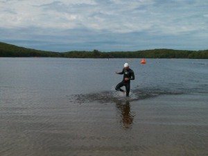 70.3 swim leader exits water