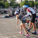 teamwork! Tony assists runner during triathlon relay 