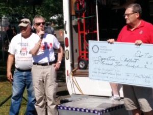 Rotary presenting check to Homeless Veterans organization