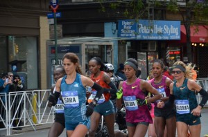 Elite women's pack near mile 17 Sara leading