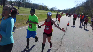 Christine high fives me near mile 10