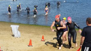 James (guide) leads cathy through 1.2mi of 2/4 mi swim